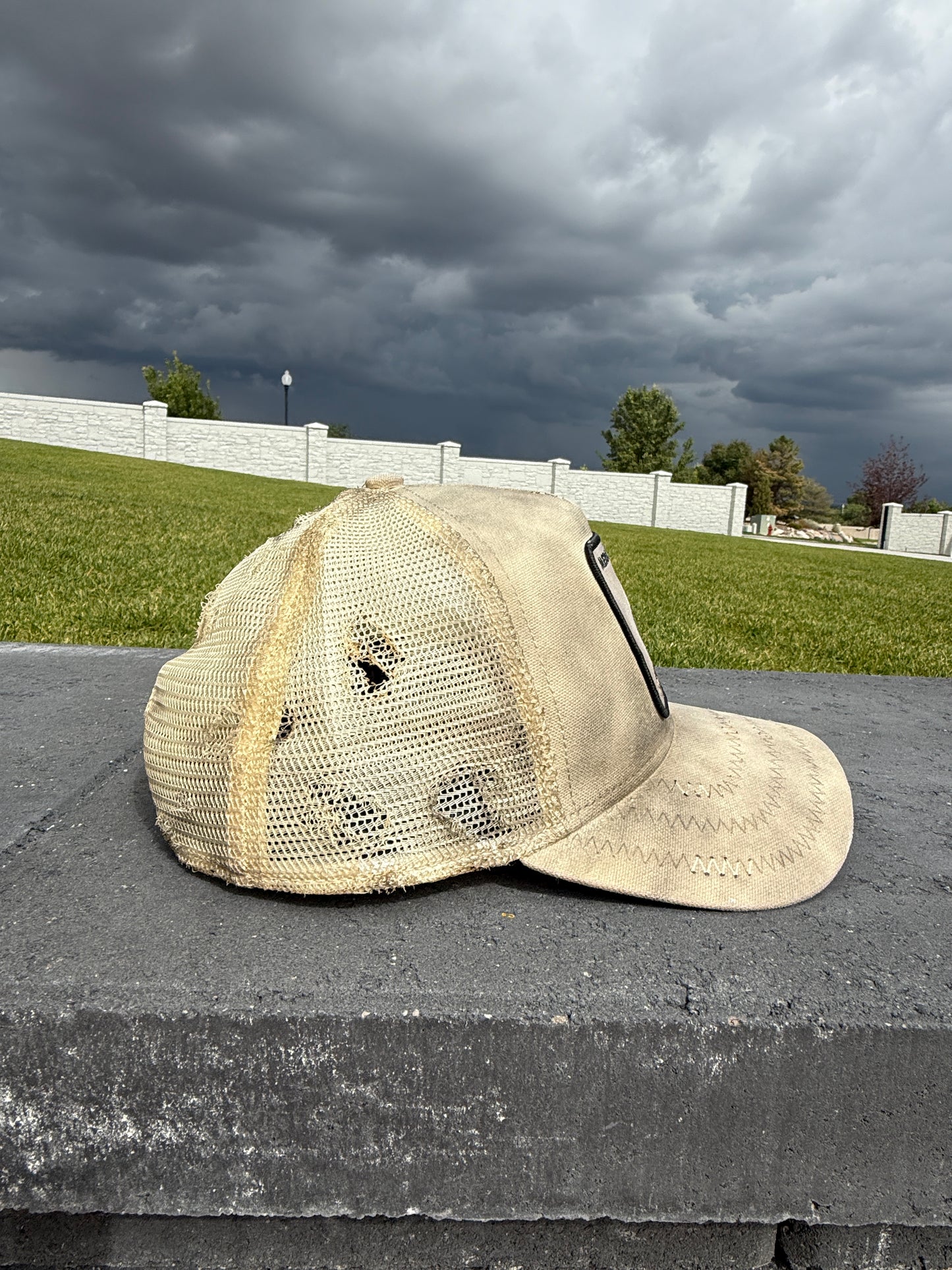 Distressed menace trucker hat