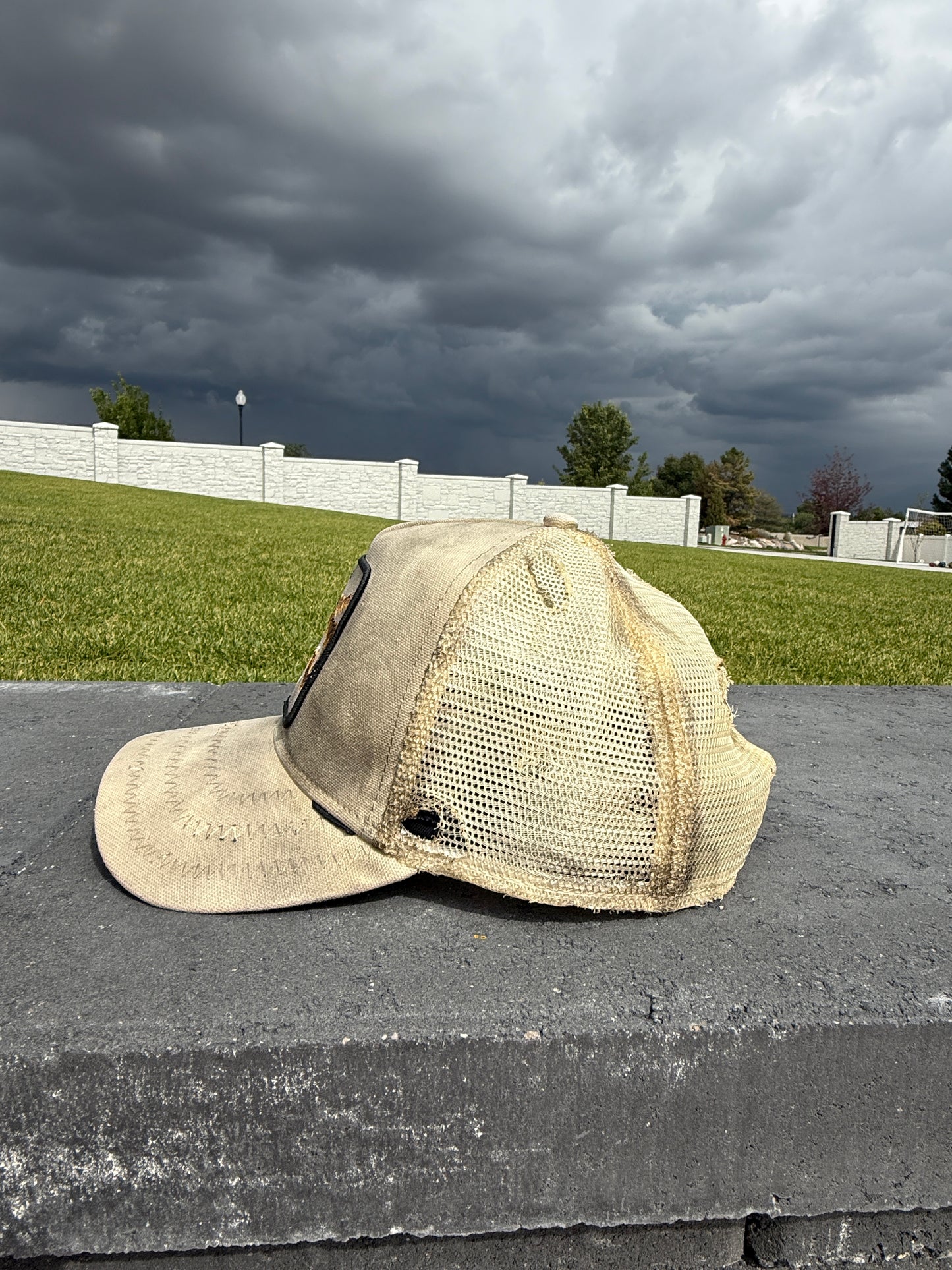Distressed menace trucker hat